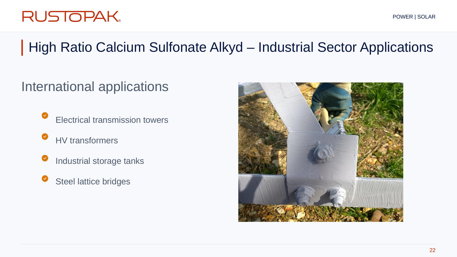 22. High Ratio Calcium Sulfonate Alkyd – Industrial Sector Applications Slide 22: Industrial application list beside a photograph of a grey-coated bolted steel joint.